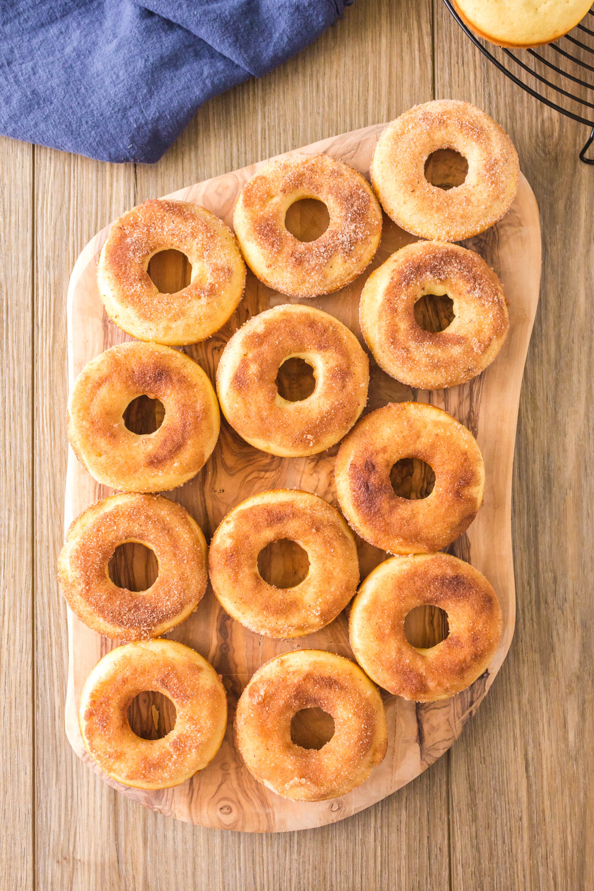 Sourdough doughnuts on a cutting board.