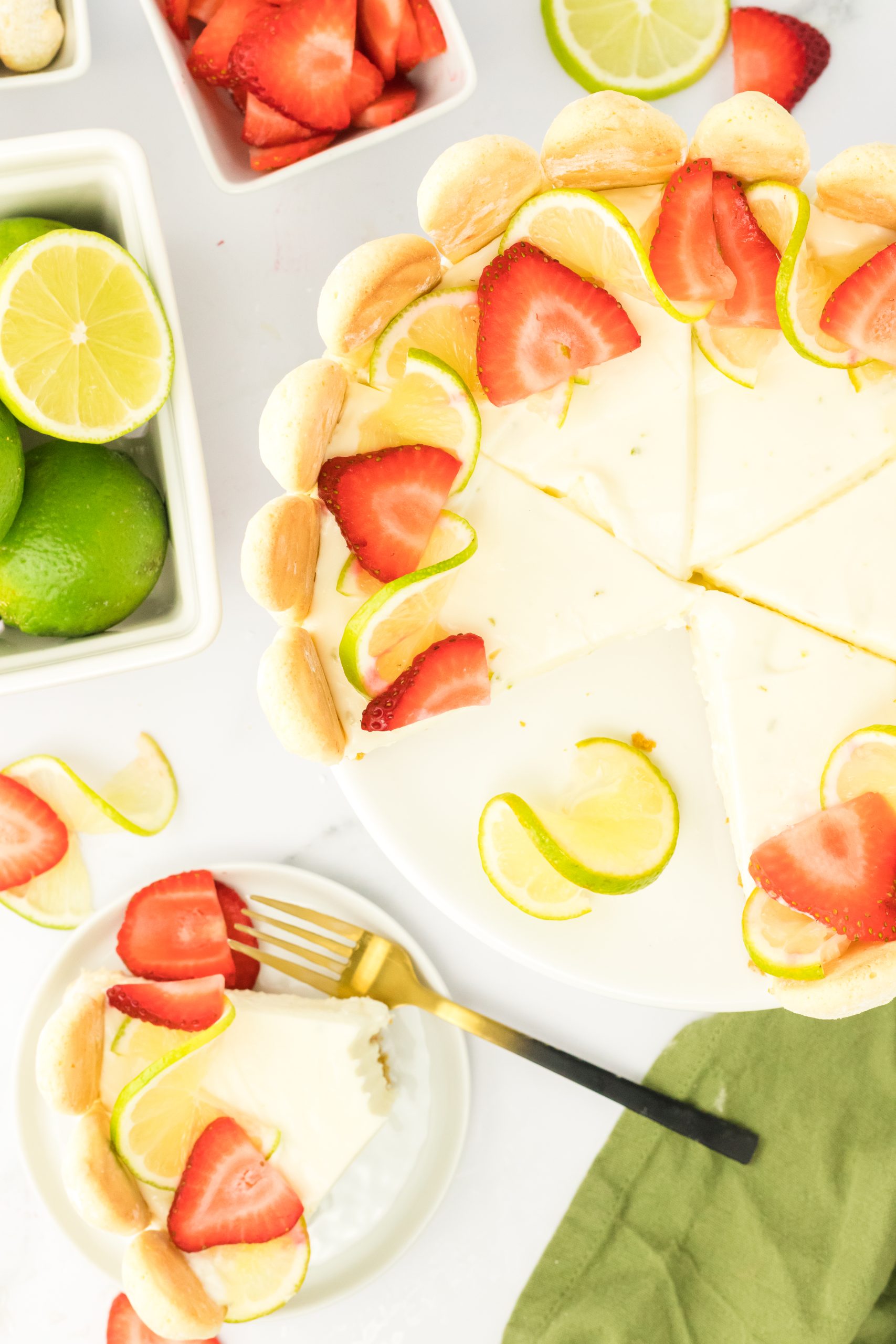 no bake lime cheesecake with one slice removed.